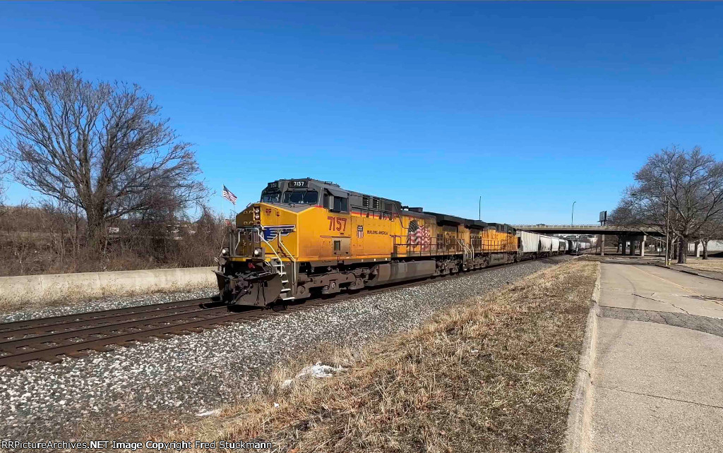 UP 7157 leads the UP empty grainer.